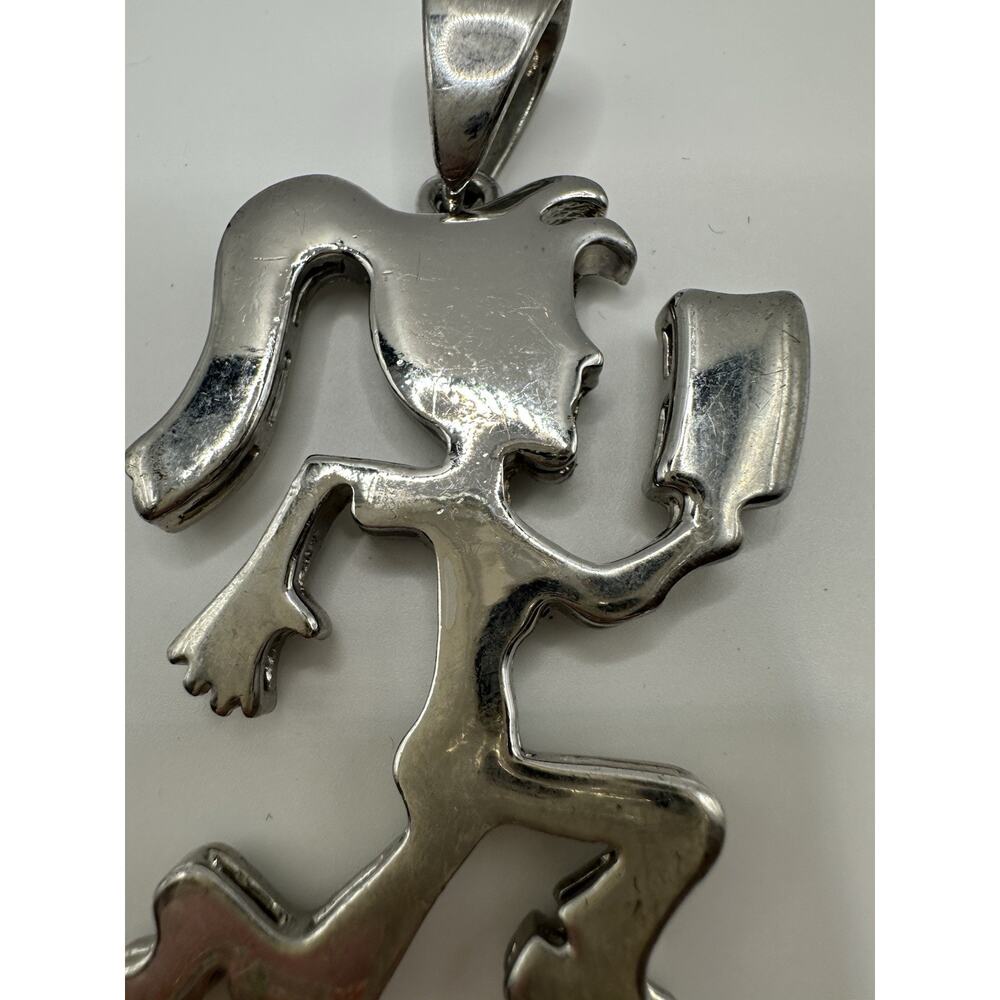 Hatchet Girl Silver Tone Metal Pendant 3” - Picture 3 of 5